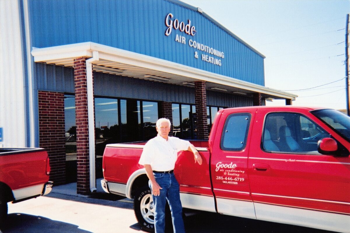 Goode Air Conditioning & Heating, Inc.  service truck parked outside a building
