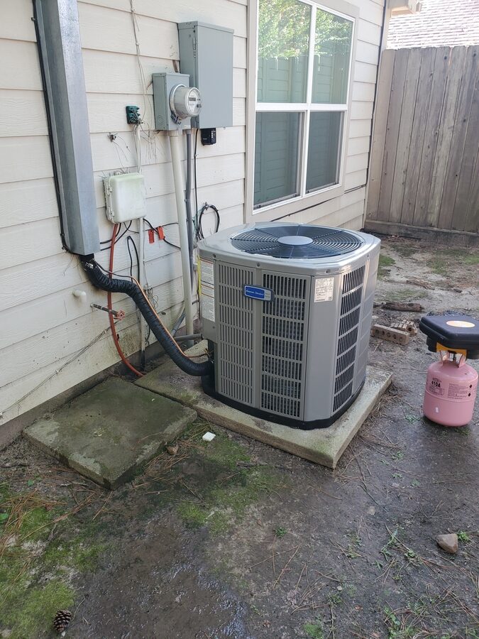 Outdoor HVAC condenser near a residential property